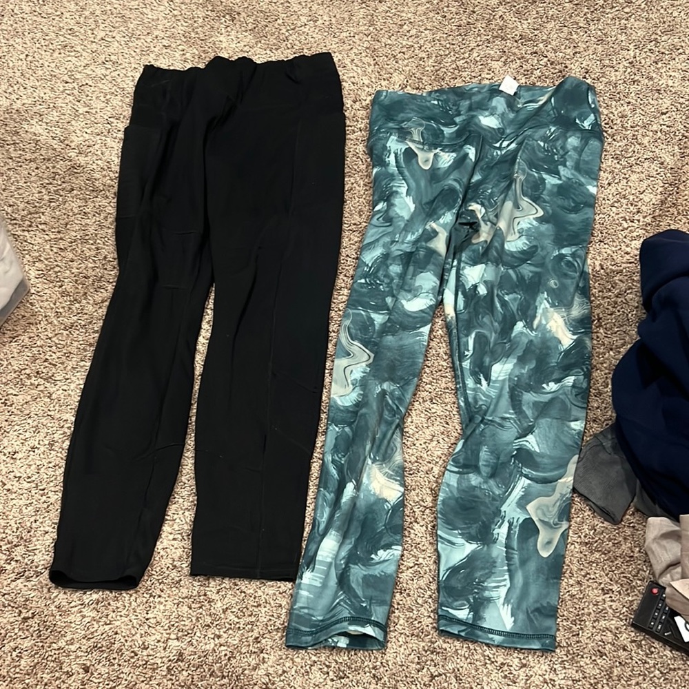 2 pairs of size large leggings